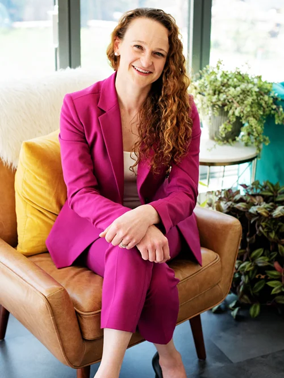 Smiling woman in bright office setting